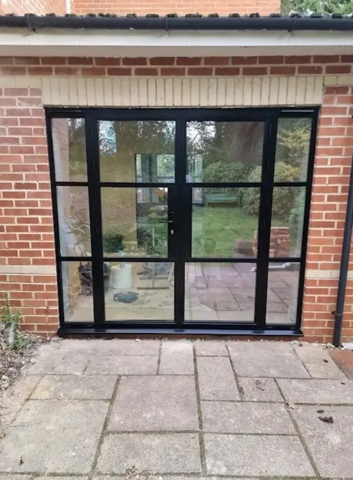 Finished glazed conservatory door installation.