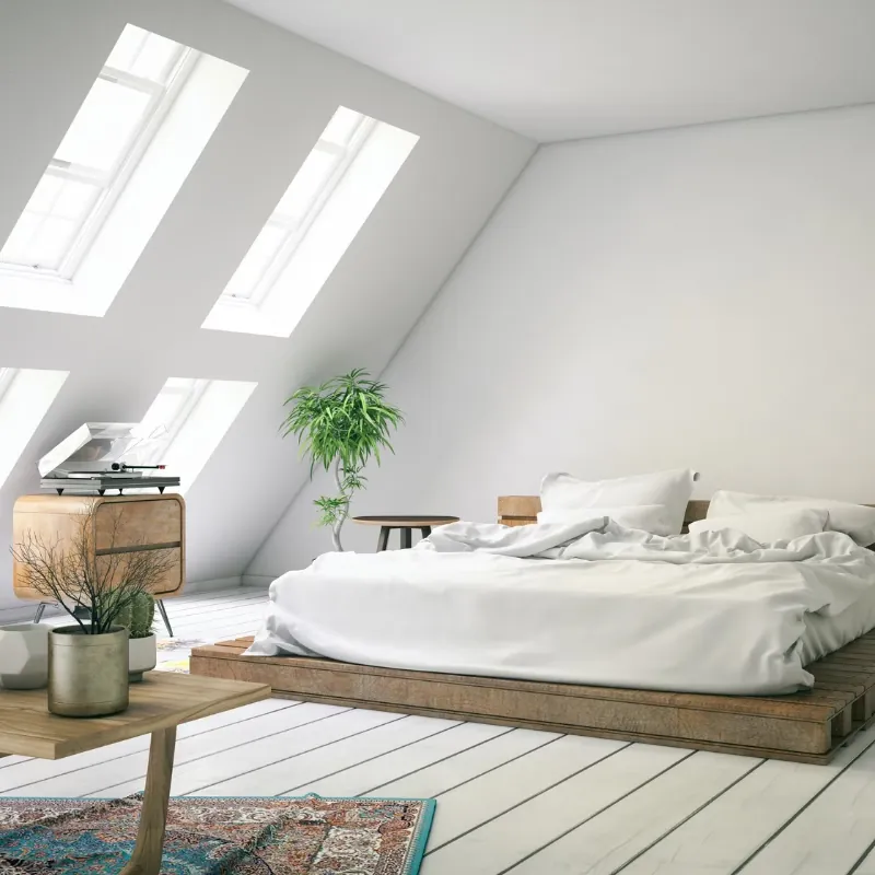 Finished loft bedroom with roof windows.