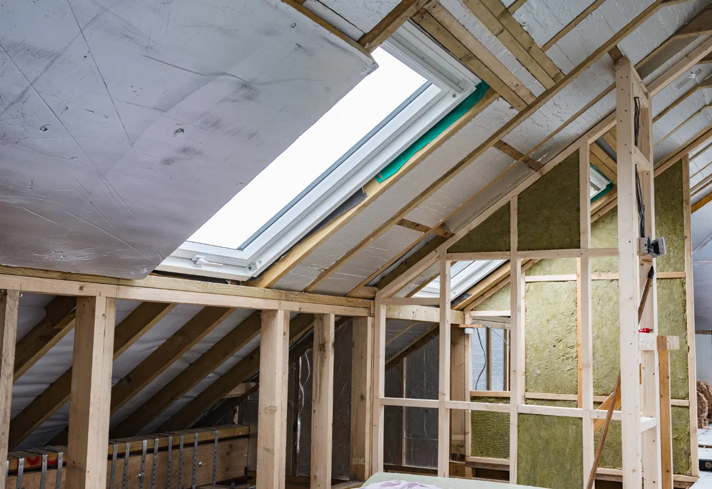 Loft conversion with roof windows and new living space
